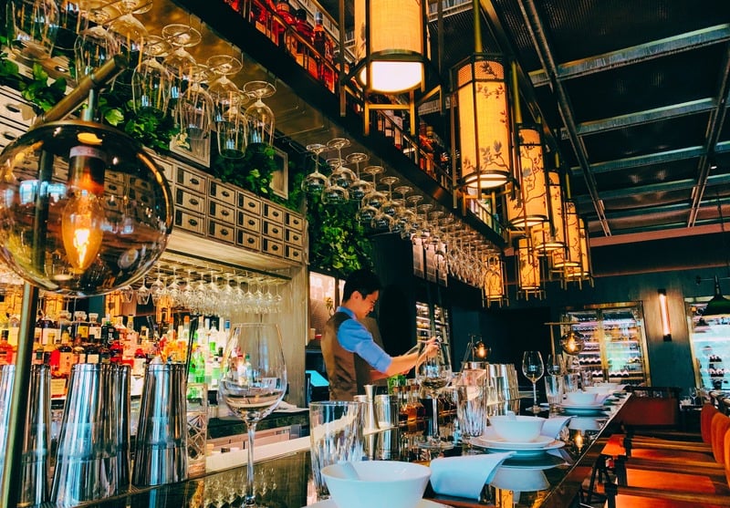 Bartender working at a bar